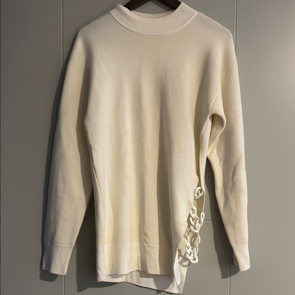 Carven size small Elegant Cream Sweater side chain detail